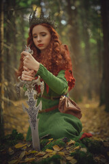 redhead princess with sword © Andrey Kiselev