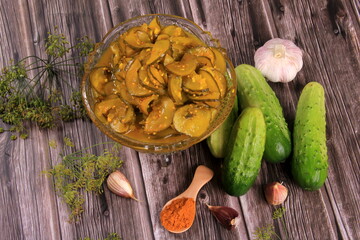 pickled cucumber salad with turmeric. home canned sweet pickles with turmeric made from family farm fresh vegetable garden cucumbers