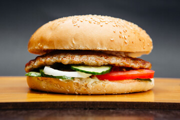 juicy burger with filling, cheese, meat
