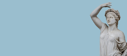 Banner with old statue of sensual bathing Renaissance Era woman at solid blue sky background with copy space, Potsdam, Germany, details, closeup. Concept of historical architecture heritage.