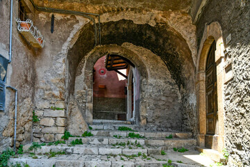 Fototapeta na wymiar Carpineto Romano, Italy, July 24, 2021. An arch at the entrance of a medieval town in the Lazio region.