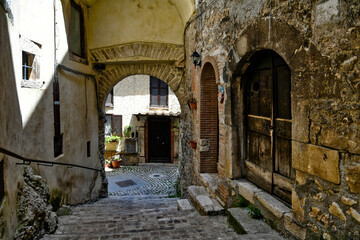 Fototapeta premium Carpineto Romano, Italy, July 24, 2021. A street in the historic center of a medieval town in the Lazio region.