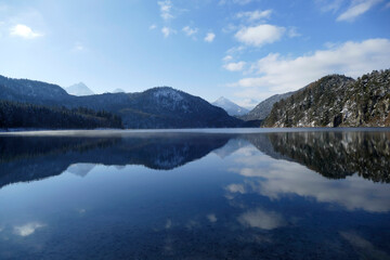 Mountain panorama at lake Alpsee in wintertime, Bavaria, Germany