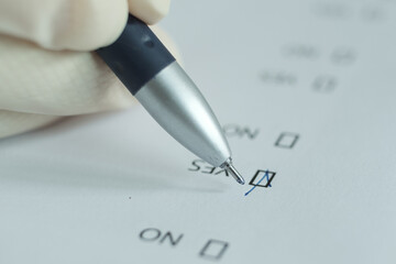 The questionnaire sheet with the answer yes.