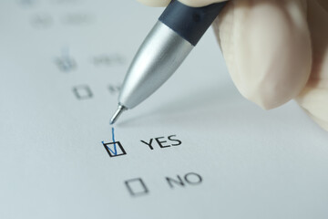 The questionnaire sheet with the answer yes.