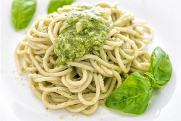 A plate of italian spaghetti with Pesto alla Genovese sauce