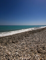 ROCK BEACH, BLUE SEA AND IN SOLEDAD
