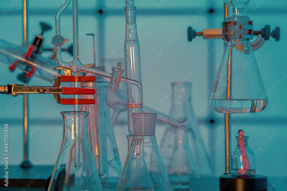 Poster Chemical workplace with test tubes, flasks and other devices