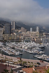 Fototapeta na wymiar Panorama of Monte Carlo in Monaco with Mediterranean Sea harbour in summer on a sunny and cloudy day
