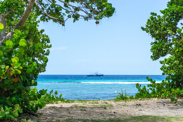 Playa Giron is a beach and village on the east bank of the Bahia de Cochinos (Bay of Pigs), which is located in the province of Matanzas, on the southern coast of Cuba. It is part of the municipality