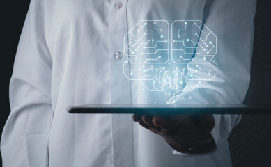 Artificial intelligence of futuristic technology concept. Hand using a finger touch on tablet screen virtual circuit AI brain genius technology in blue background.