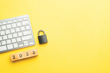 Internet cybersecurity concept with lock and keyboard in 2022 with copy space.