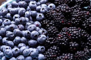blueberries and blackberries close-up. Fruit, berry background.