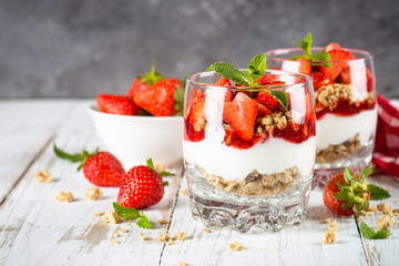 Greek yogurt with fresh strawberry and granola. Parfait.