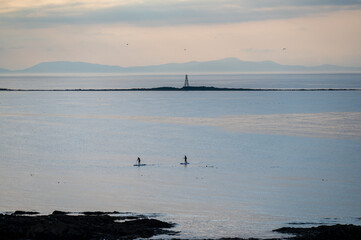 Paddle boarding in the sea