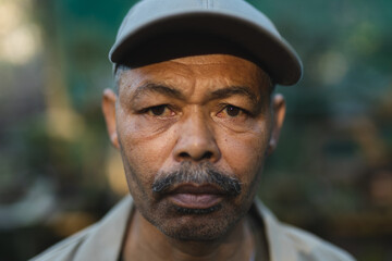 Portrait of african american male gardener looking at camera at garden centre