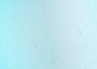 Blurred winter photo overlay. Empty space. Light background with fluffy flying snowflakes.