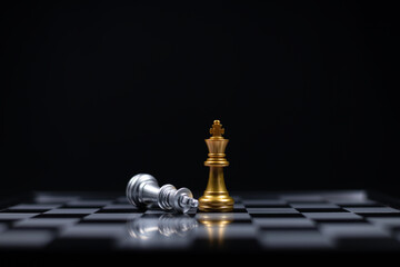 Chess board game between silver team and golden team is stategy game as business challange...