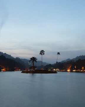 Travel view of blue hour at Seema Malakaya, Sri Dalada Maligawa temple island on Kandy lake, near Temple of the Tooth in Kandy, Sri Lanka.