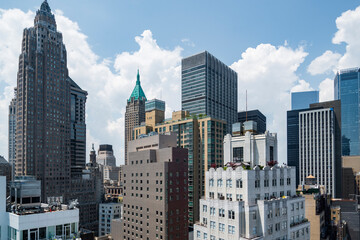 Fototapeta na wymiar New York City lower Manhattan skyline view with skyscrapers and blue sky in the day.