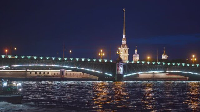 Saint-Petersburg, RUSSIA - May 29 2021, 4k: pleasure craft in Neva river, view Trinity bridge and Peter and Paul fortress, on May 29, 2021 in Saint-Petersburg, Russia