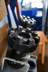 Close up of CNC turning lathe cutter tool. High-toughness drill with hard alloy teeth. Low depth of...