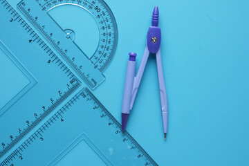 A picture of geometry side on copyspace blue background.