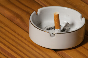 Cigarette extinguished in ashtray