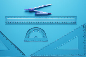 A picture of geometry side on copyspace blue background.