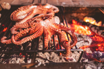 Summer barbecue with octopus in the camping in Puglia