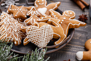 Homemade christmas gingerbread cookies on wooden table.