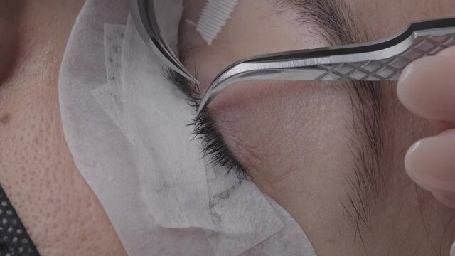Close up of false eyelash placement on the eye