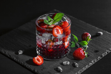 Strawberry lemonade with honeysuckle and ice.