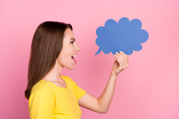 Photo of charming excited lady wear yellow t-shirt smiling looking empty space holding speaking...