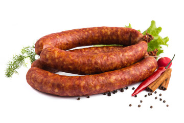 baked smoked sausage with lard on a white plate