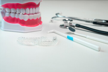 Invisalign braces and tools for dental care, dental healthcare and Orthodontic concept.