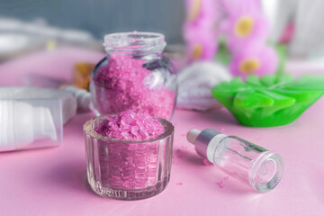 Spa treatment kit. Lavender-scented sea salt, aromatic oils and creams are prepared for the treatments. Skin care