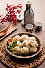 Meat dumplings on a plate.