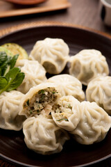 Meat dumplings on a plate.