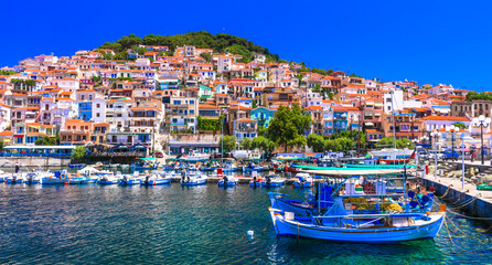 Traditional colorful Greece  - charming Plomaripn town. Fishing boats in the port, Lesvos island, Eastern Sporades