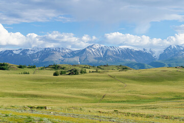 Altai mountain range with snow-covered peaks. Kurai steppe.