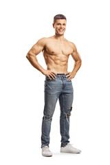 Fototapeta premium Full length portrait of a smiling shirtless man wearing jeans and posing