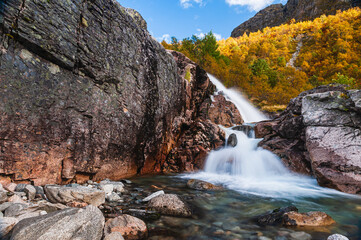 Fototapeta na wymiar Waterfall in the mountains, Norway
