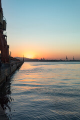 Naklejka premium sunset in a seaport