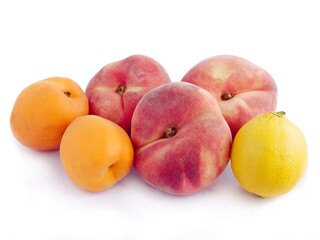 tasty fruits apricots and peaches close up