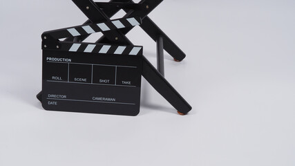Black Clapper board or movie slate with director chair use in video production or movie and cinema...