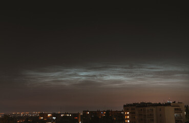 Fototapeta premium Noctilucent clouds shining in the sky during midnight
