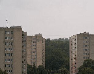 Fototapeta na wymiar High block buildings in Europe. Aged concrete residential houses.