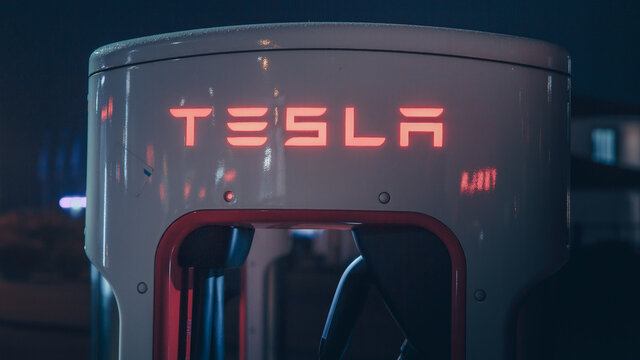 tesla supercharger at night