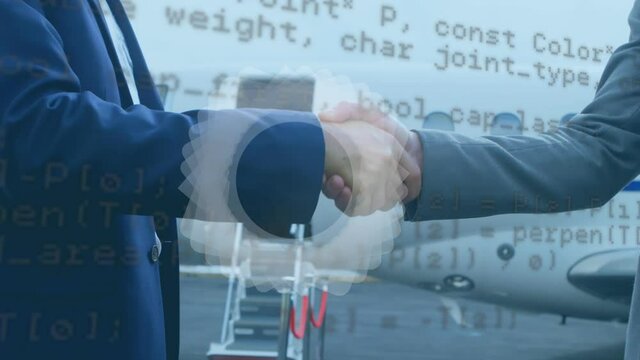 Abstract shape and data processing on mid section of two businessmen shaking hands at airport runway